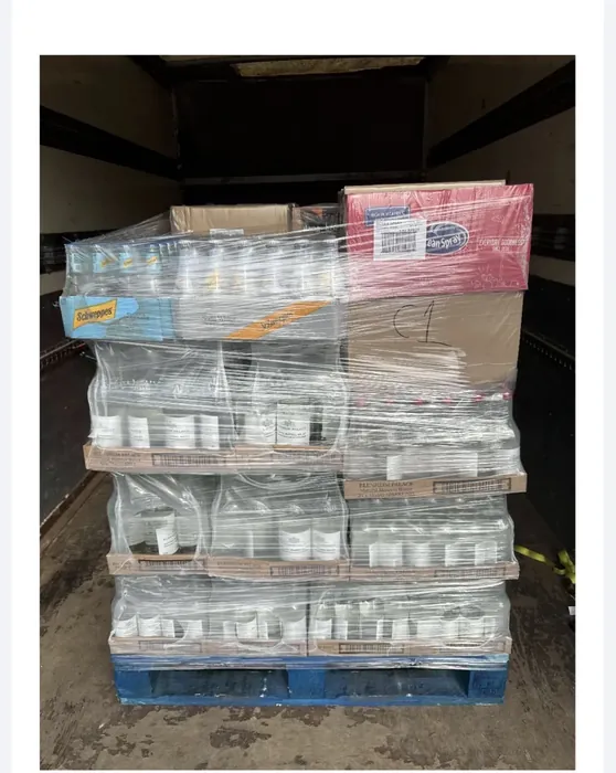 A shrink-wrapped pallet, strapped and ready for transport. We handle palletised loads up to a Luton van with a tail-lift, for businesses that need a dedicated, direct run rather than a parcel network.