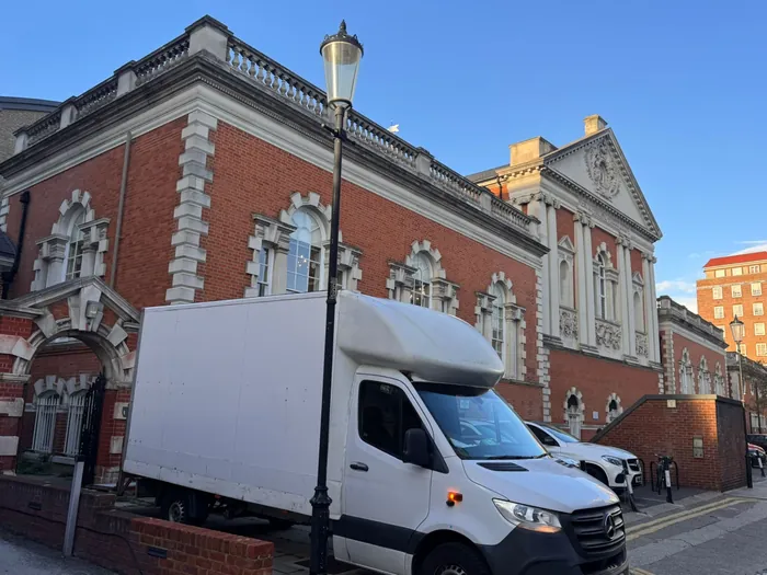 Our van parked up on a job at a London landmark building. From residential streets to busy town centres, we plan access and loading around each site.